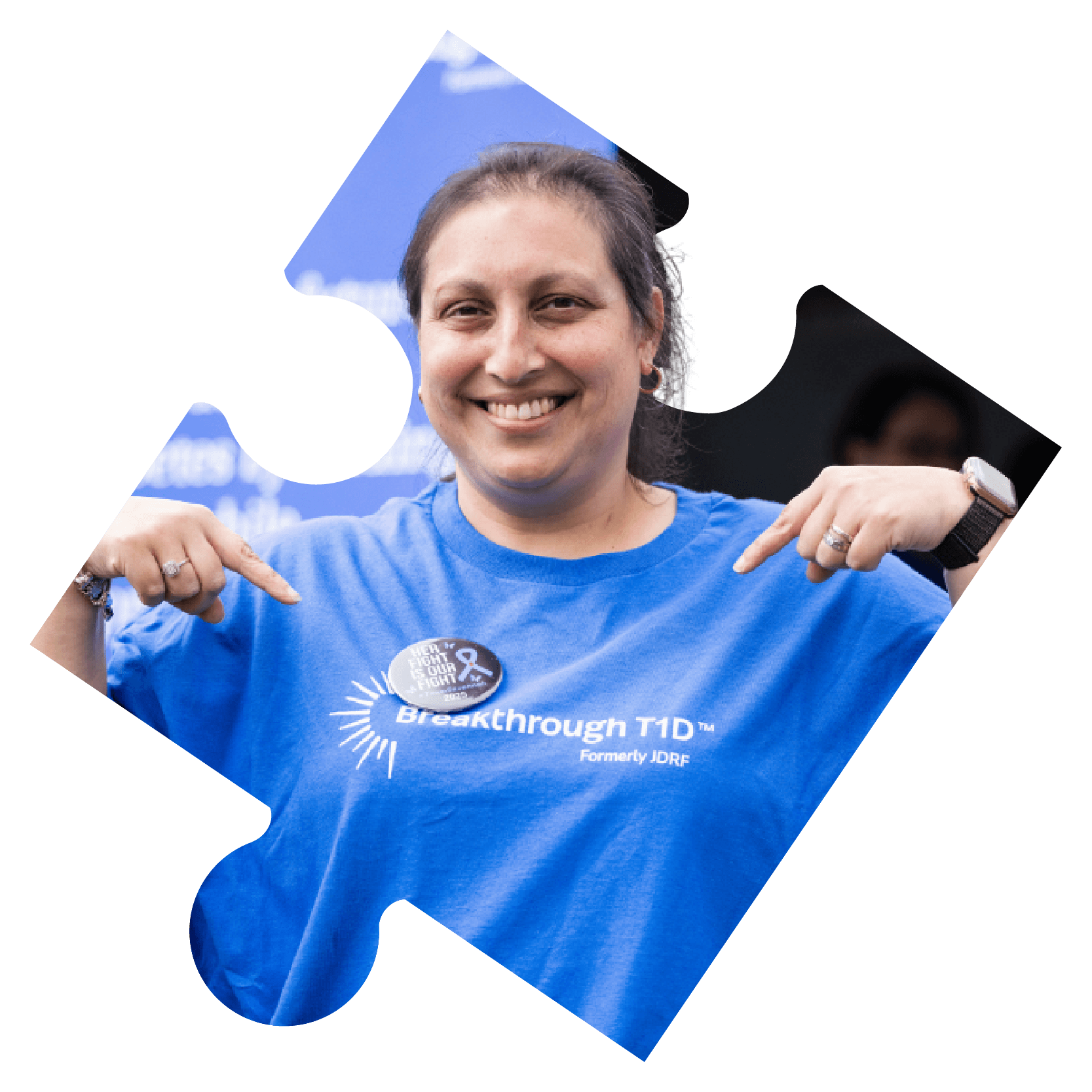 A woman in a Breakthrough T1D branded blue T-shirt.